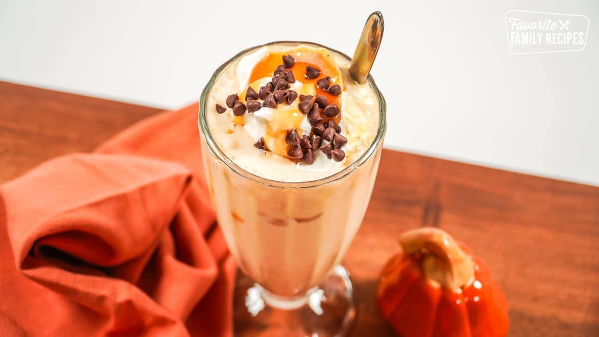 Pumpkin milkshake with chocolate chips sprinkled on top