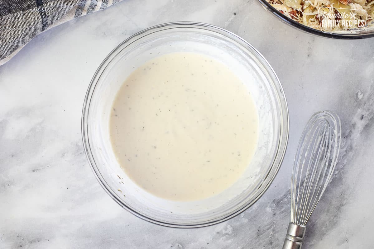 Bowl of ranch sauce for White Chicken Lasagna.