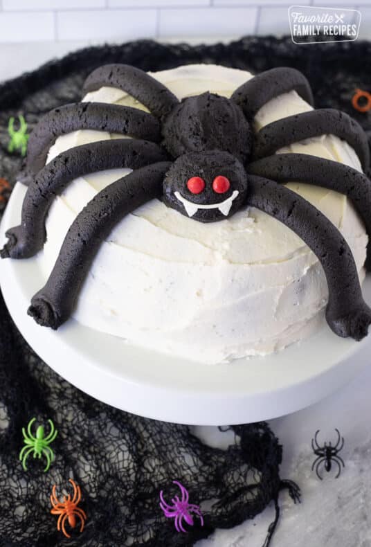 Spider cake on a cake stand.