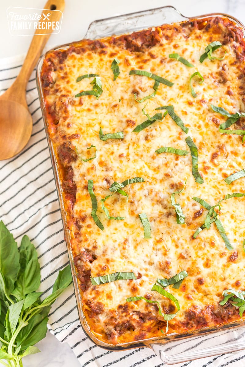 Spaghetti casserole in a glass baking dish.