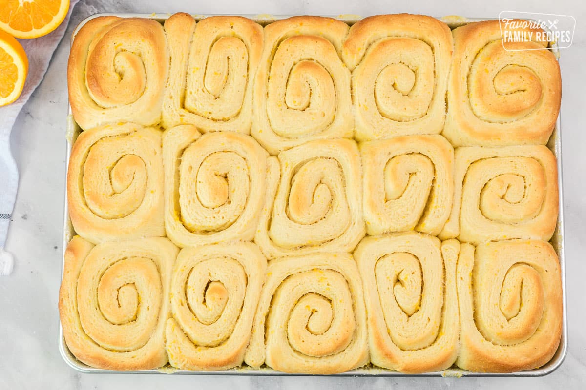 Baked Homemade Orange Rolls in a pan.