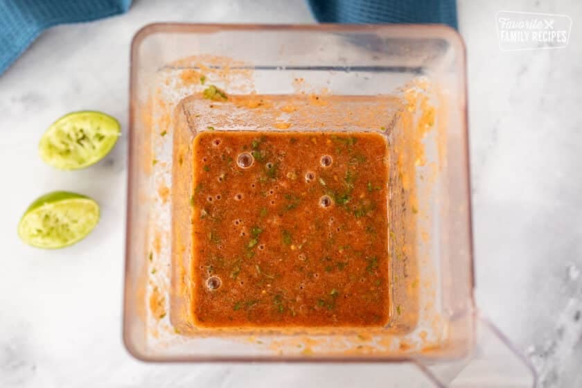 Blender with blended up Homemade Salsa with fresh tomatoes.