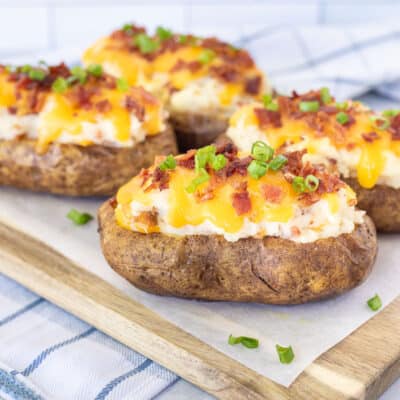 Twice Baked Potatoes with cheddar cheese, bacon and green onion.