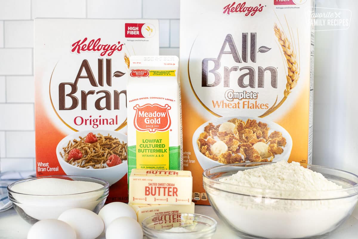 Ingredients to make Bran Muffins including All-Bran flakes, All-Bran original cereal, buttermilk, butter, sugar, eggs, baking soda and flour.