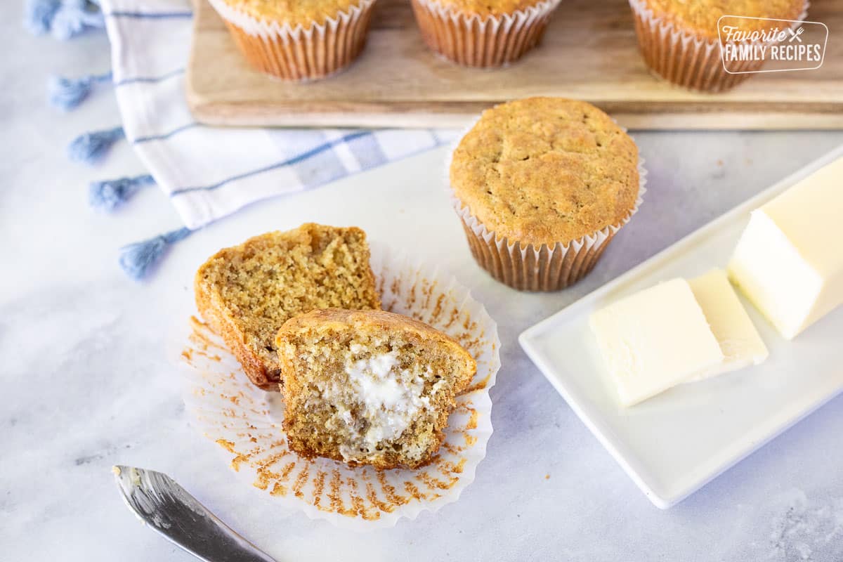 Bran Muffin cut in half with butter spread.