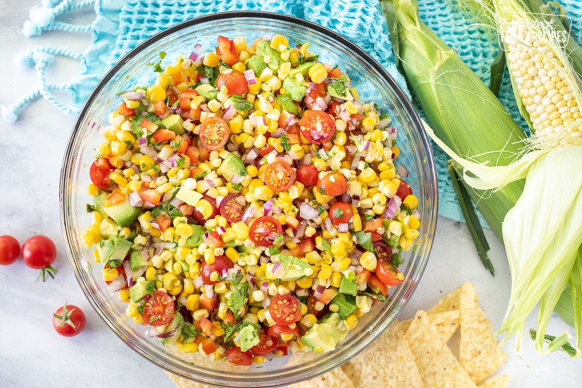 Bowl of Fresh Corn Salsa with tortilla chips.