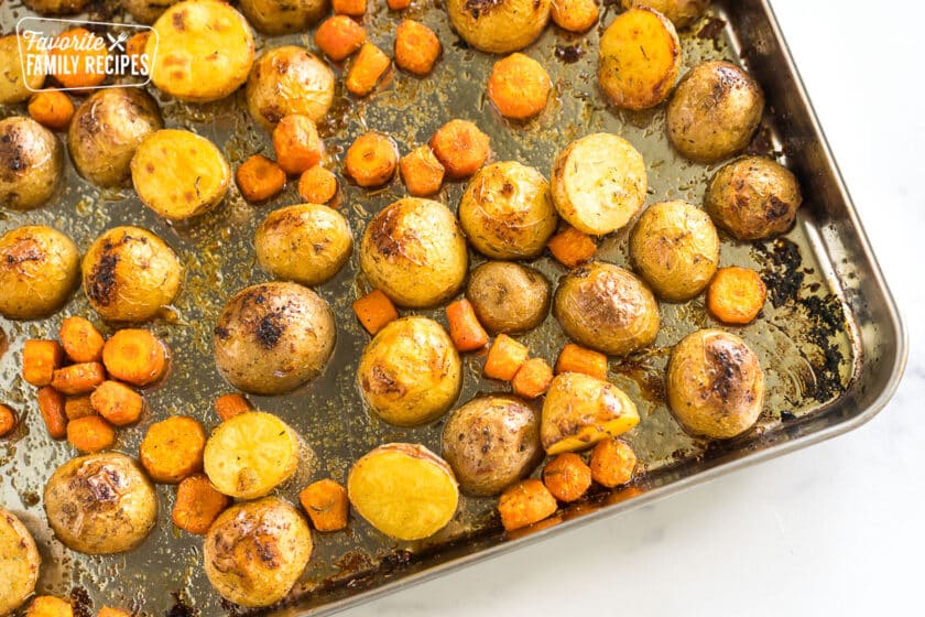 Roasted Carrots and Potatoes on a baking sheet