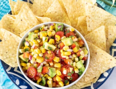 Bowl of Fresh Corn Salsa with Tortilla Chips.