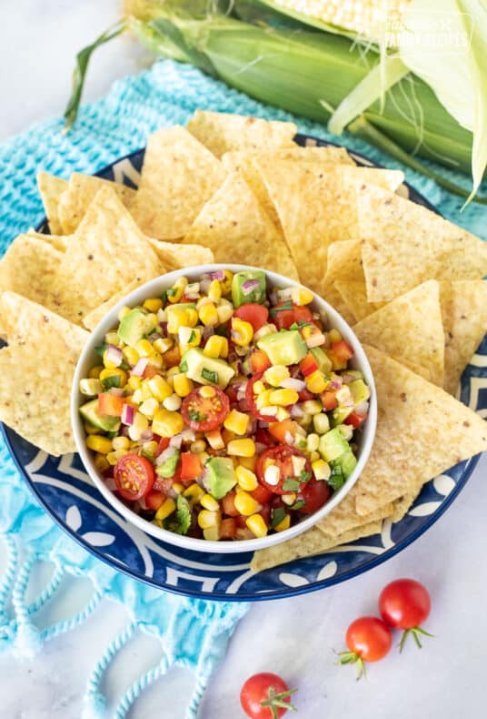 Bowl of Fresh Corn Salsa with Tortilla Chips.