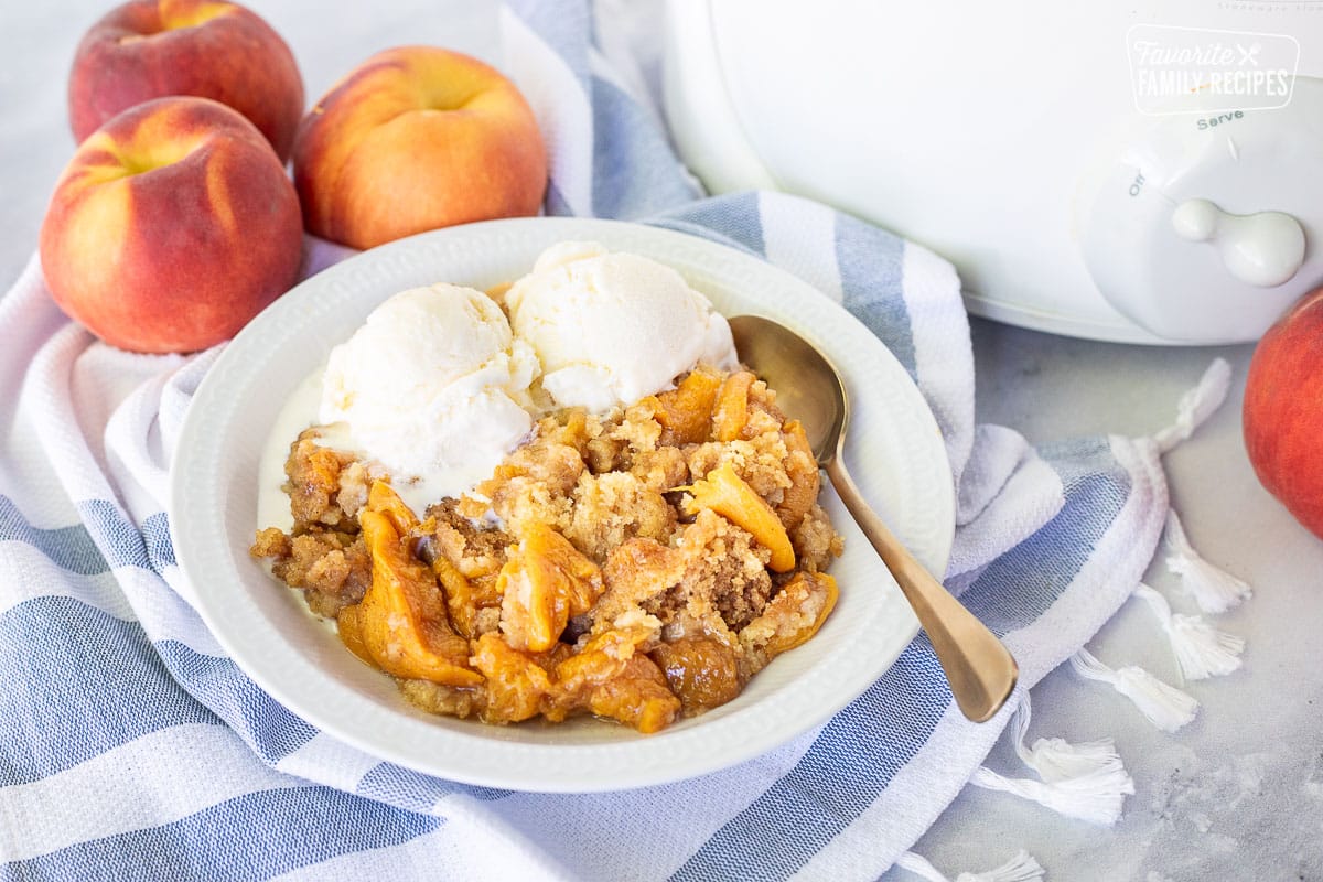 Melted ice cream with Crock Pot Peach Cobbler.