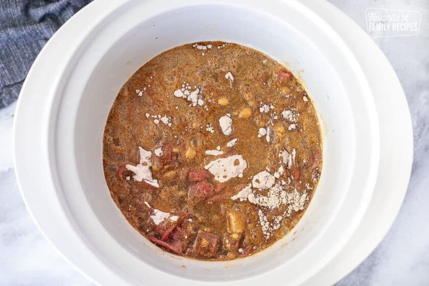 Crockpot with water added to the steak and gravy dry mixes.