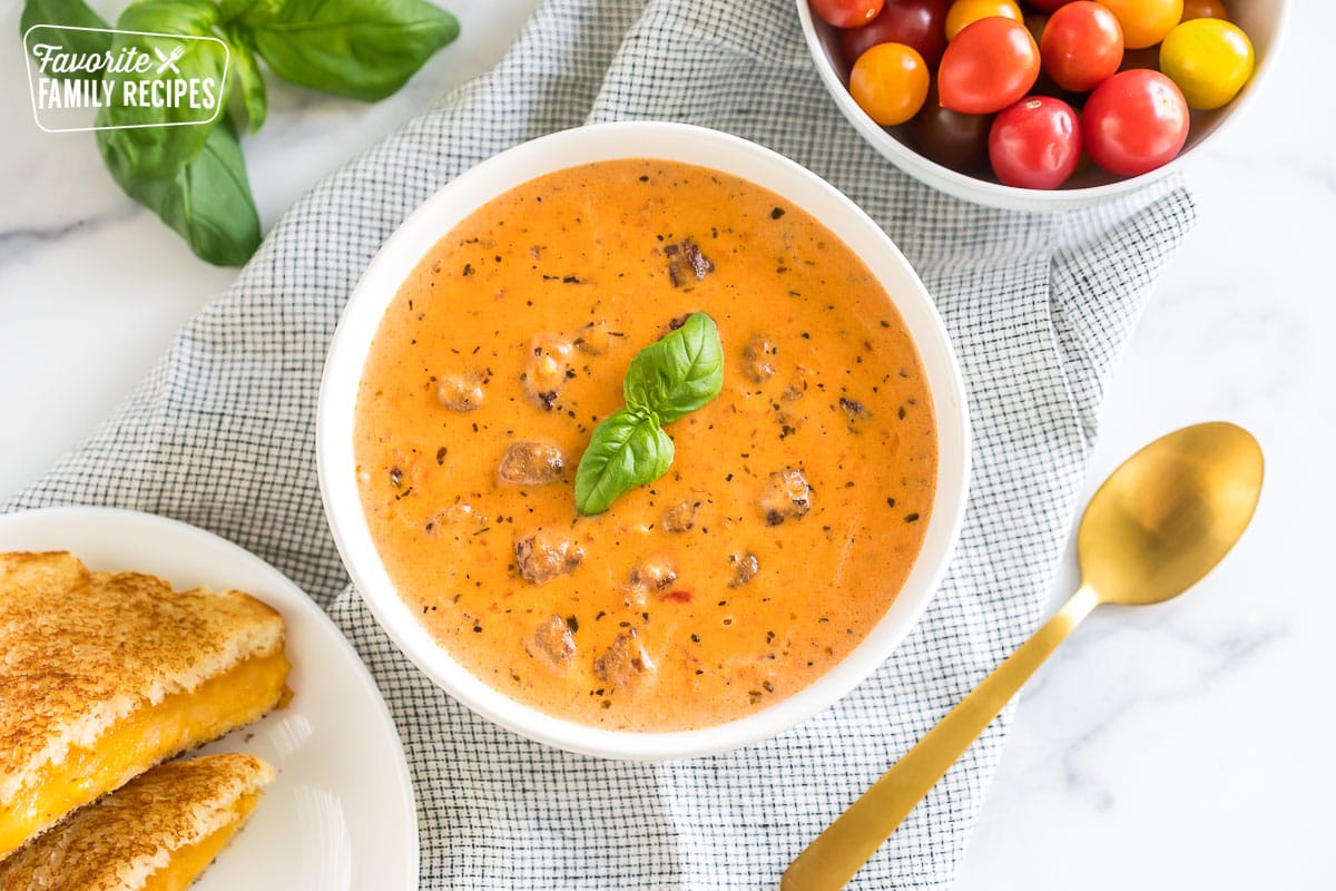 creamy tomato basil soup in a bowl