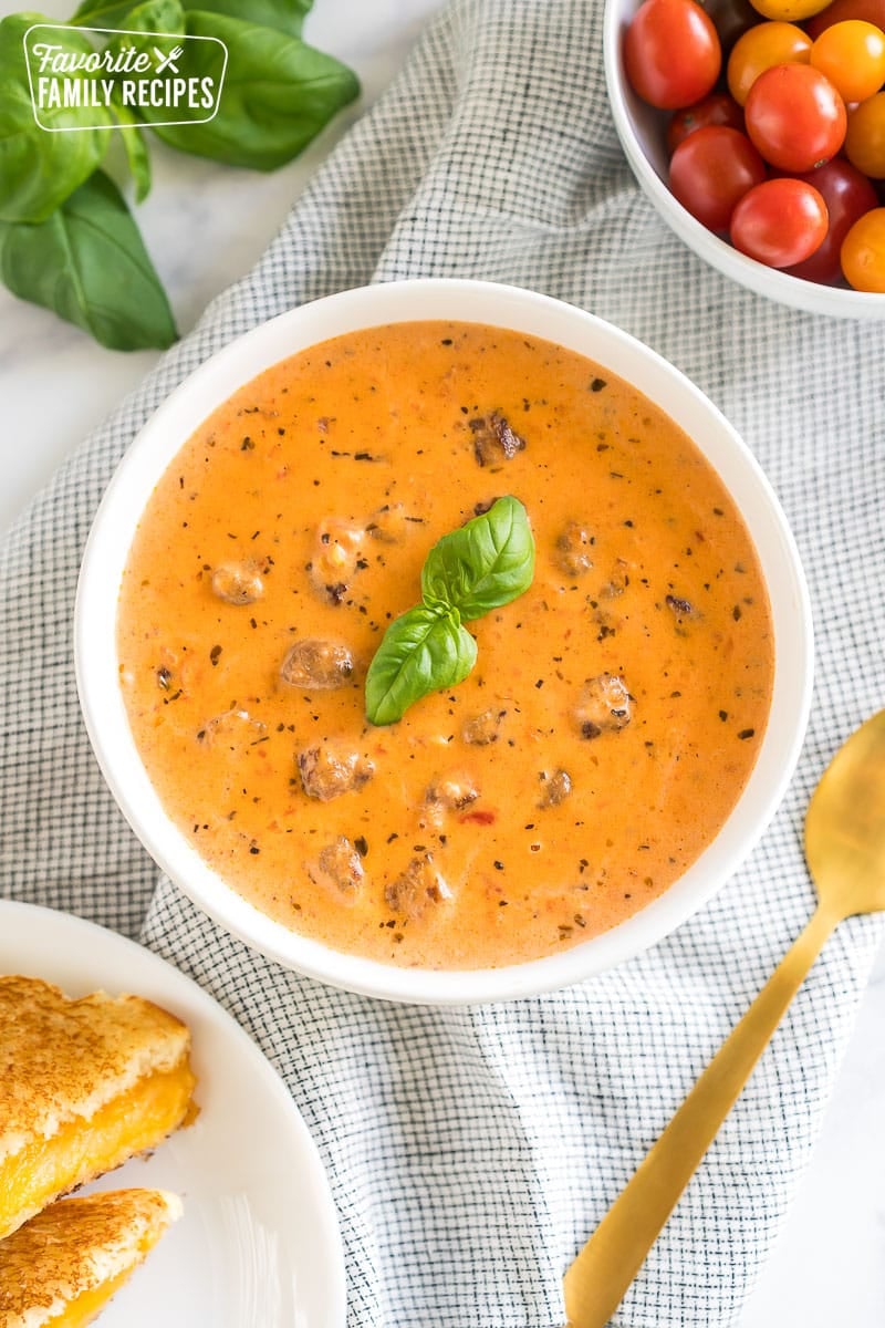 creamy tomato basil soup in a bowl