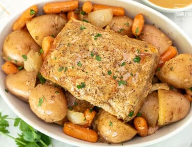 Platter of Crock Pot Pork Roast with vegetables.
