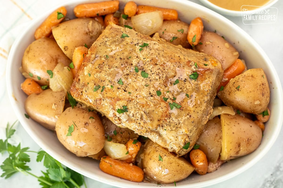 Platter of Crock Pot Pork Roast with vegetables.