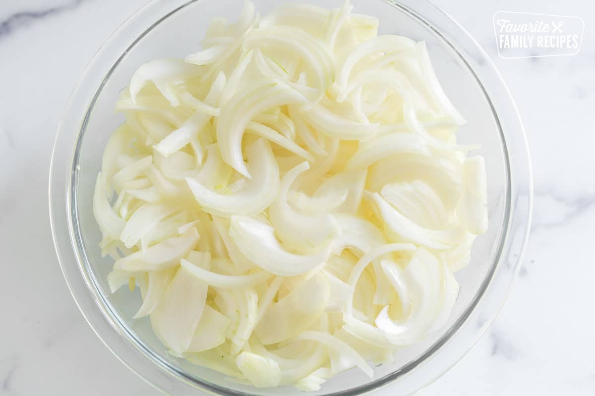 a bowl of sliced onions