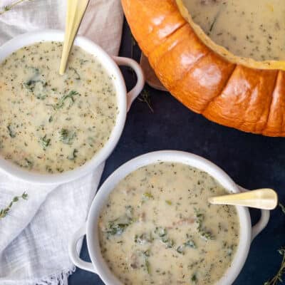Bowls of Soup in a Pumpkin next to pumpkin.