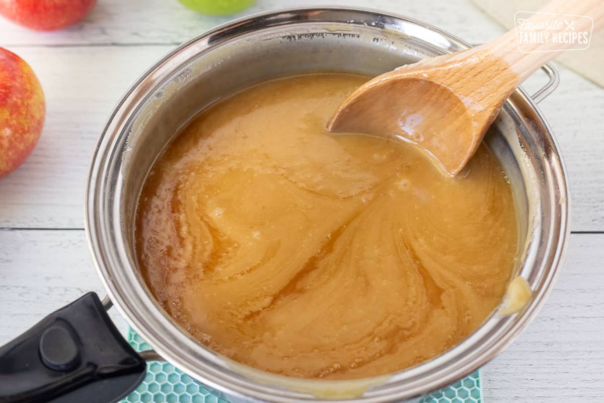 Stirring vanilla into Caramel Apple Dip.
