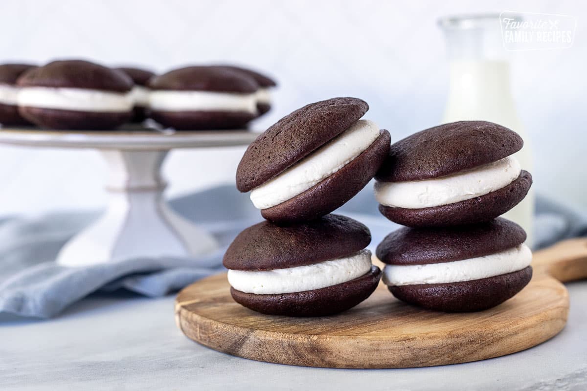 Four stacked Whoopie Pies on a board.