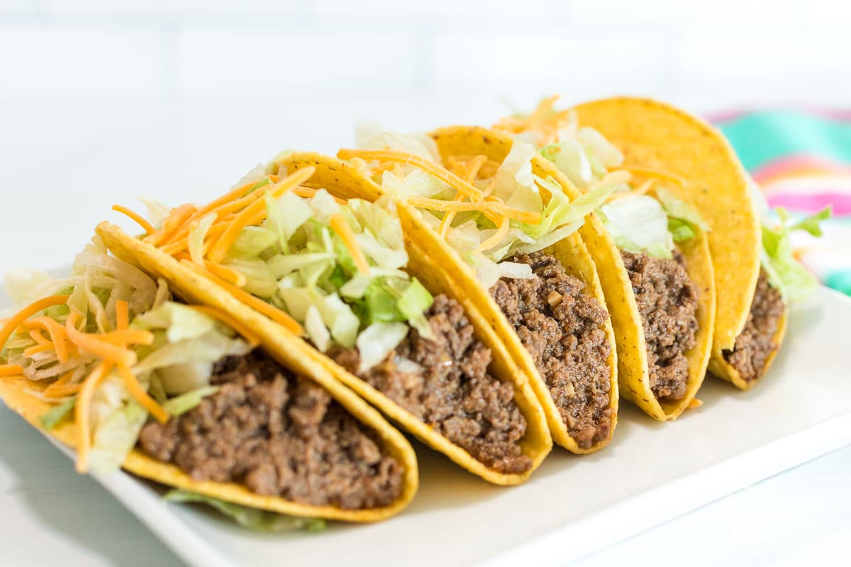 A side view of a tray of Taco Bell tacos