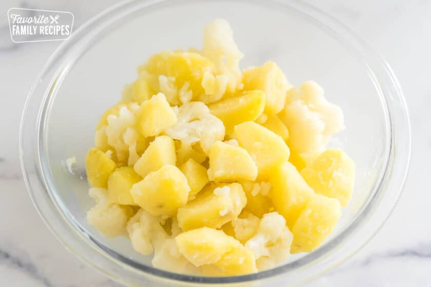 cooked potatoes and cauliflower in a bowl