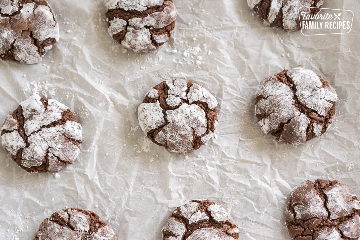 chocolate crinkle cookies on a baking sheet
