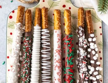 Platter of Christmas Dipped Pretzel Rods.