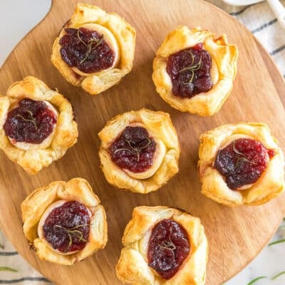 Cranberry Brie Bites on a wooden board