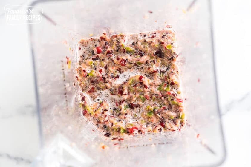 cranberries, jalapenos, lime, green onion, and sugar in a blender