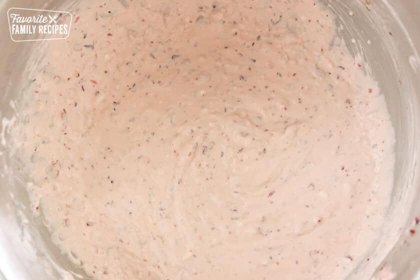 cranberry jalapeno dip in a mixing bowl