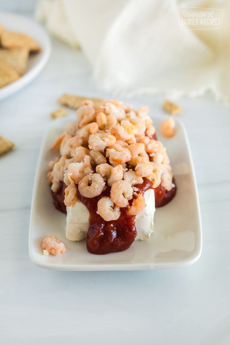 cream cheese shrimp dip on a rectangular plate.
