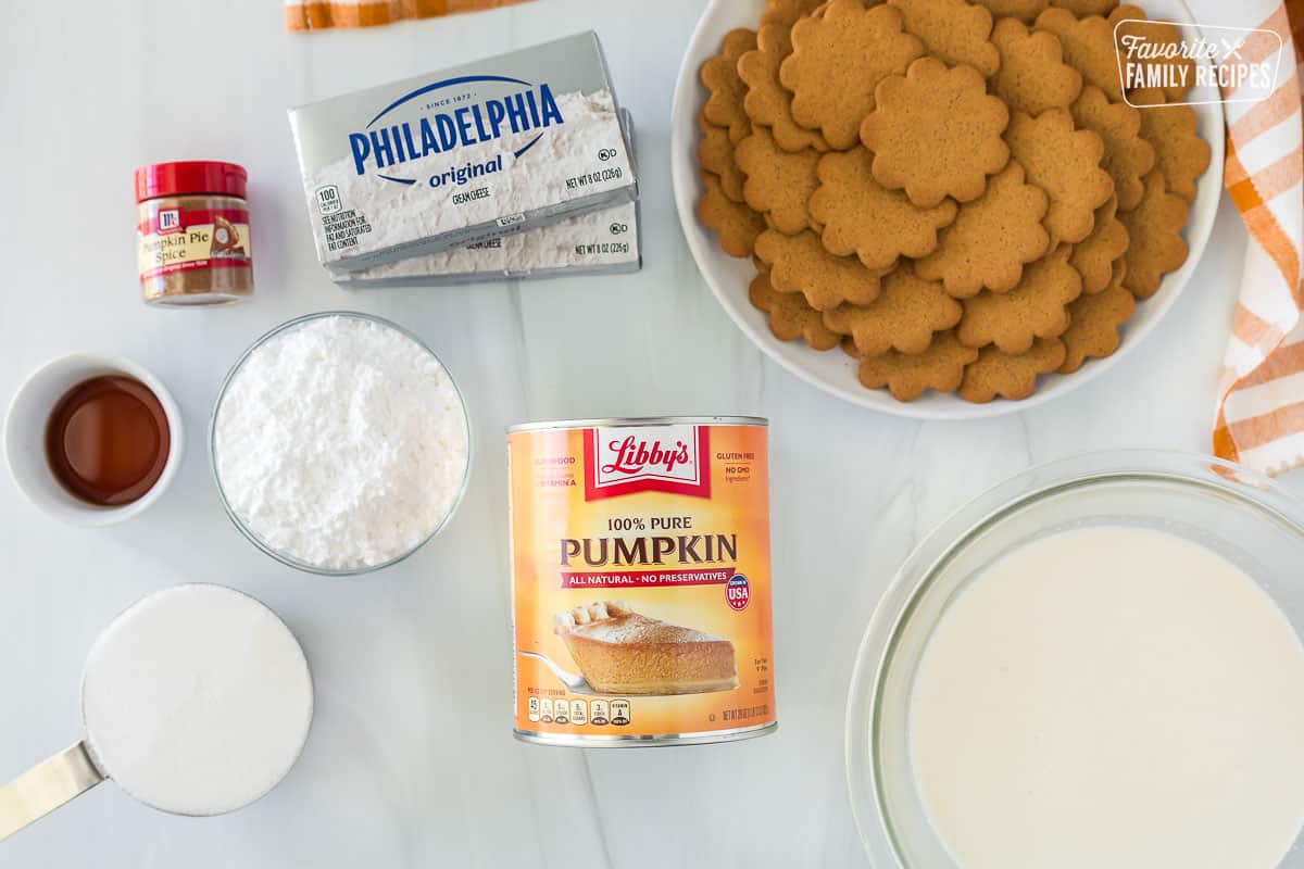 Ingredients for Easy Pumpkin Trifle. Including cream cheese, gingersnap cookies, sugar, powdered sugar vanilla extract, pumpkin puree, whipping cream, and pumpkin pie spice.