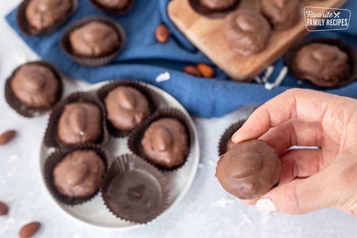 Hand holding a Homemade Almond Joy.