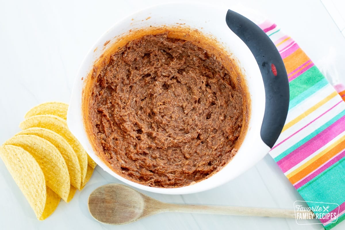 A bowl with ground beef and taco seasoning combined