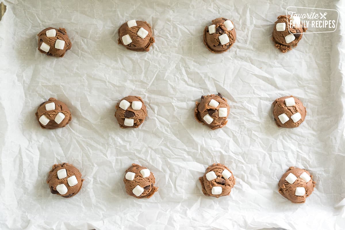 Hot Chocolate Cookie dough balls on a baking sheet