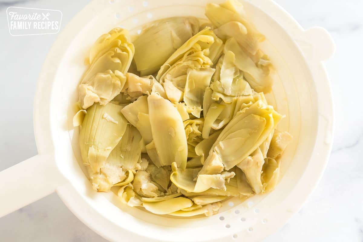 boiled artichokes in a strainer