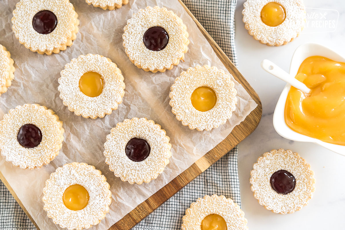 Linzer cookies on a cutting board