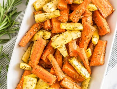 oven roasted carrots and parsnips on a serving platter
