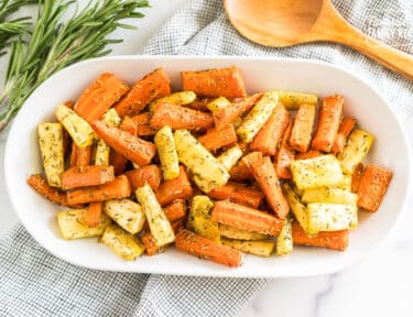 oven roasted carrots and parsnips on a serving platter