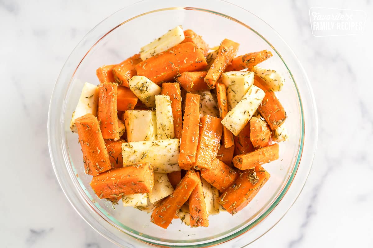 Seasoned carrots and parsnips in a bowl