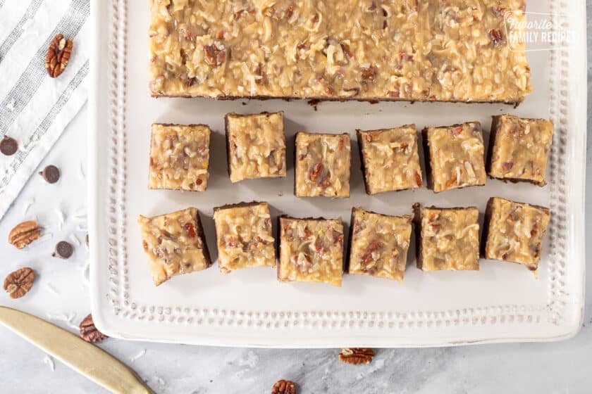 Cut up pieces of German Chocolate Fudge on a serving platter.
