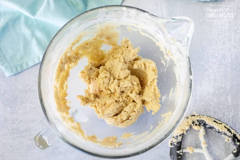 Mixing bowl with snowball cookie batter without pecans.