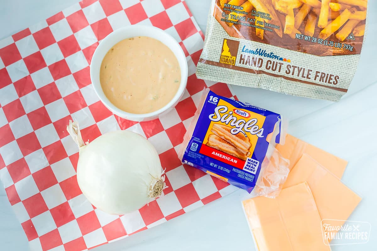 Ingredients to make animal style fries on a table