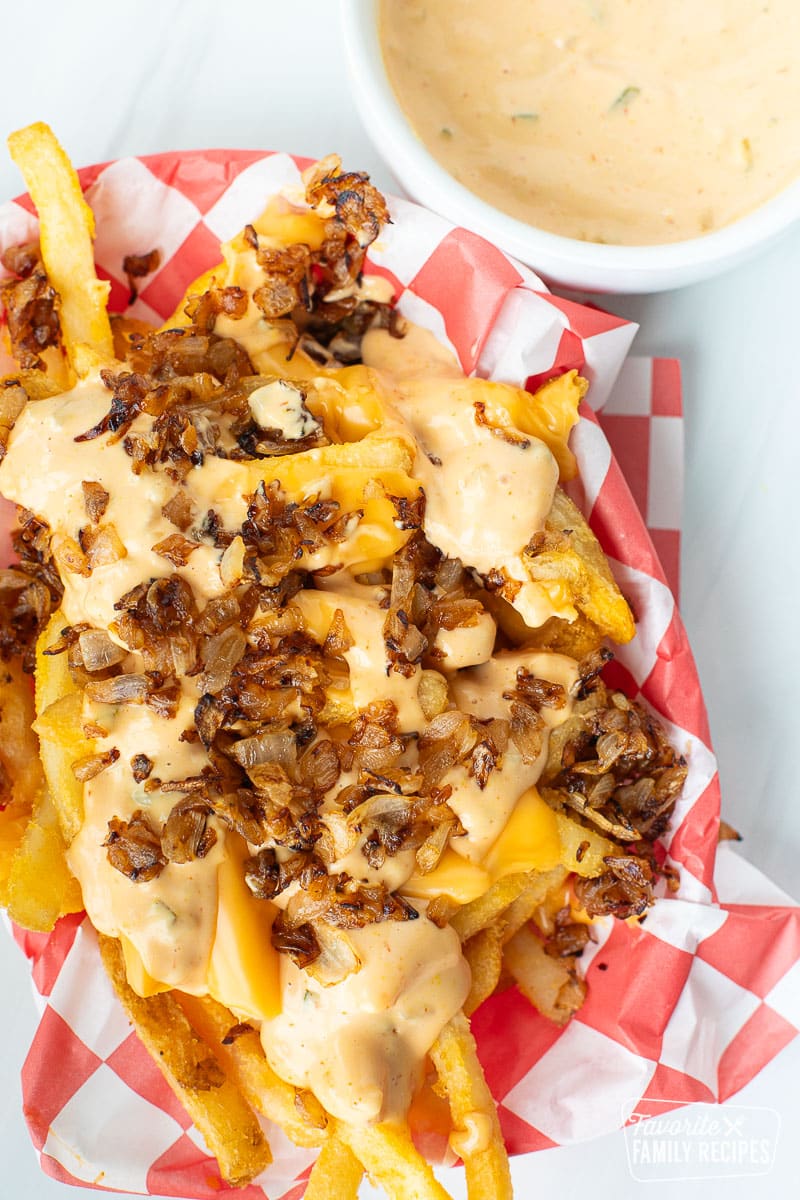 A vertical image of In-N-Out animal style fries