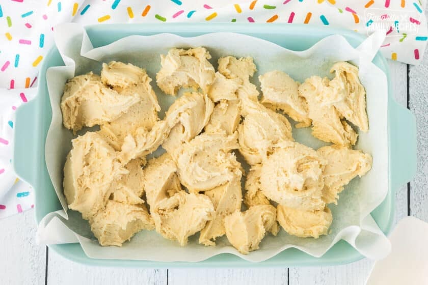 Blobs of Sugar Cookie dough in a baking dish.