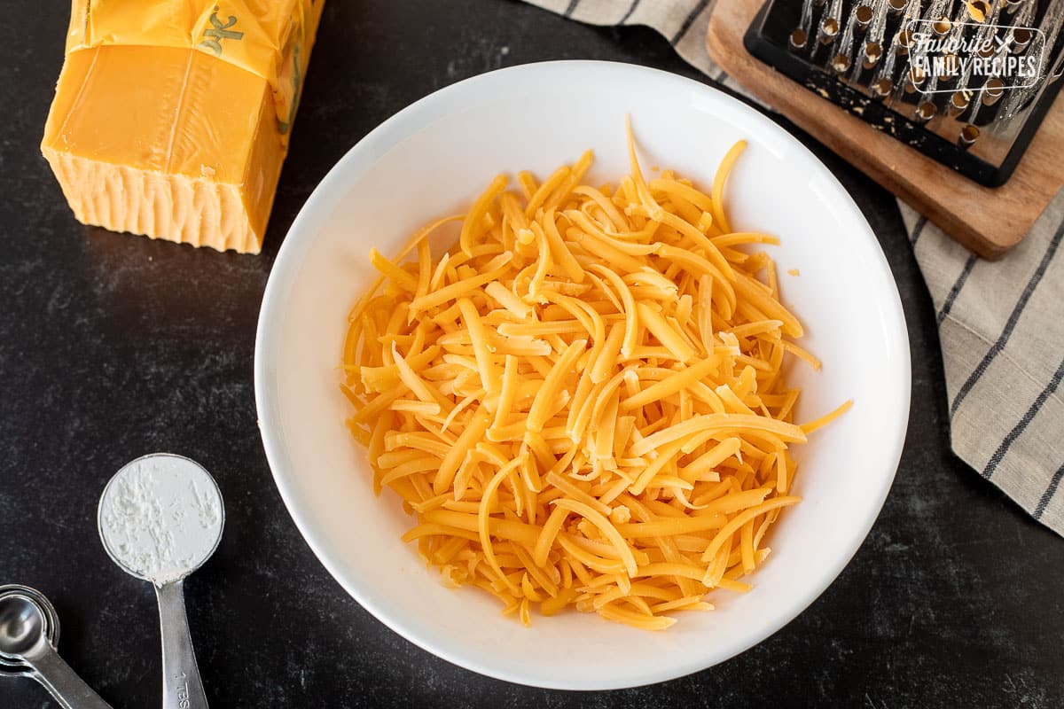 https://www.favfamilyrecipes.com/wp-content/uploads/2023/11/Bowl-of-grated-cheese-to-freeze.jpg