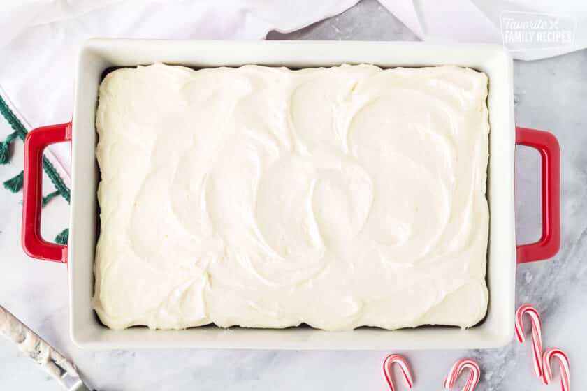 Baking dish of frosted White chocolate brownies.