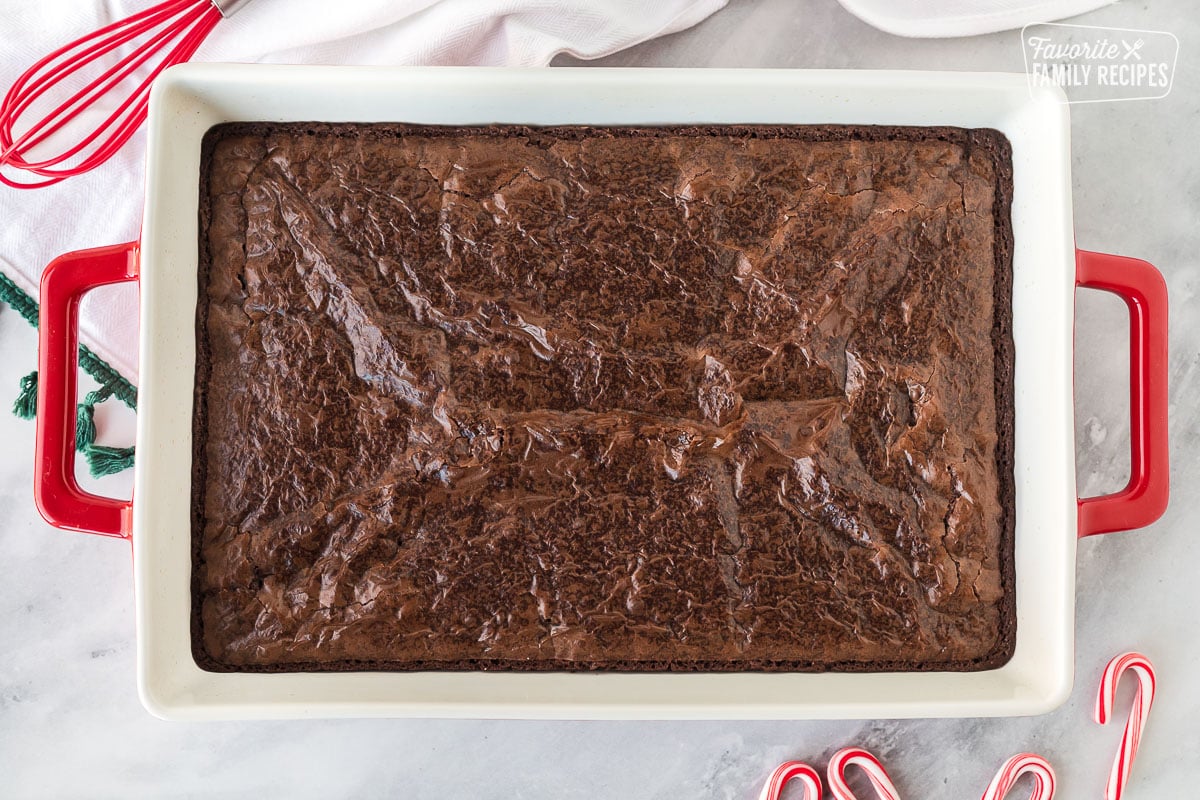 Baked brownies in a glass 9x13" baking dish.
