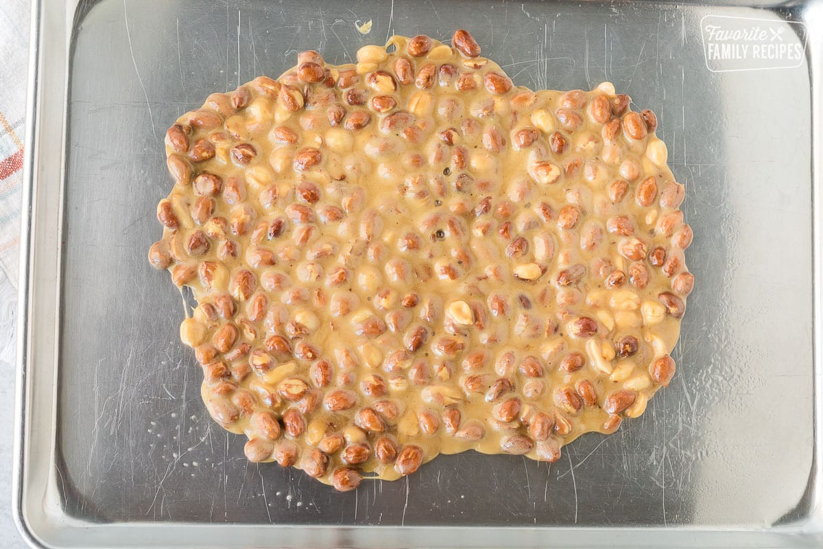Cooled Peanut Brittle on a baking sheet.