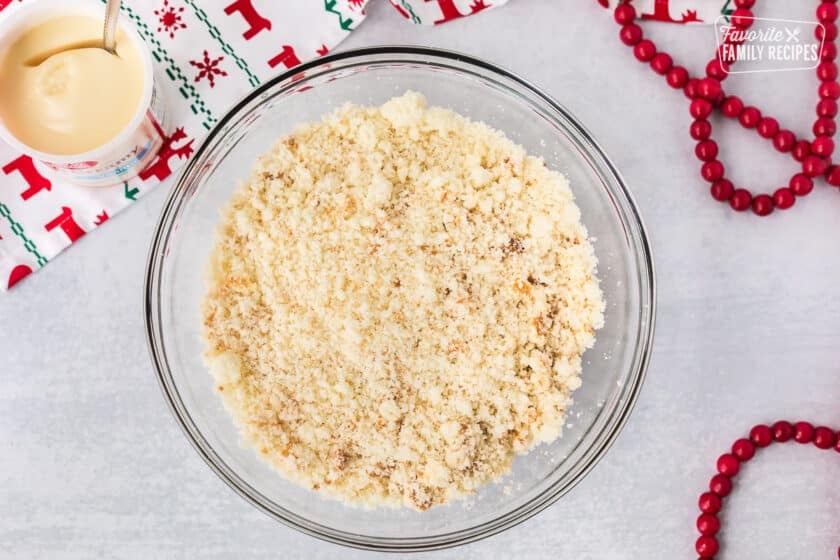 Mixing bowl with crumbled white cake to make cake pops for the holidays